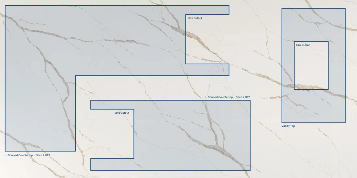 Countertop pieces planned on a slab before cutting